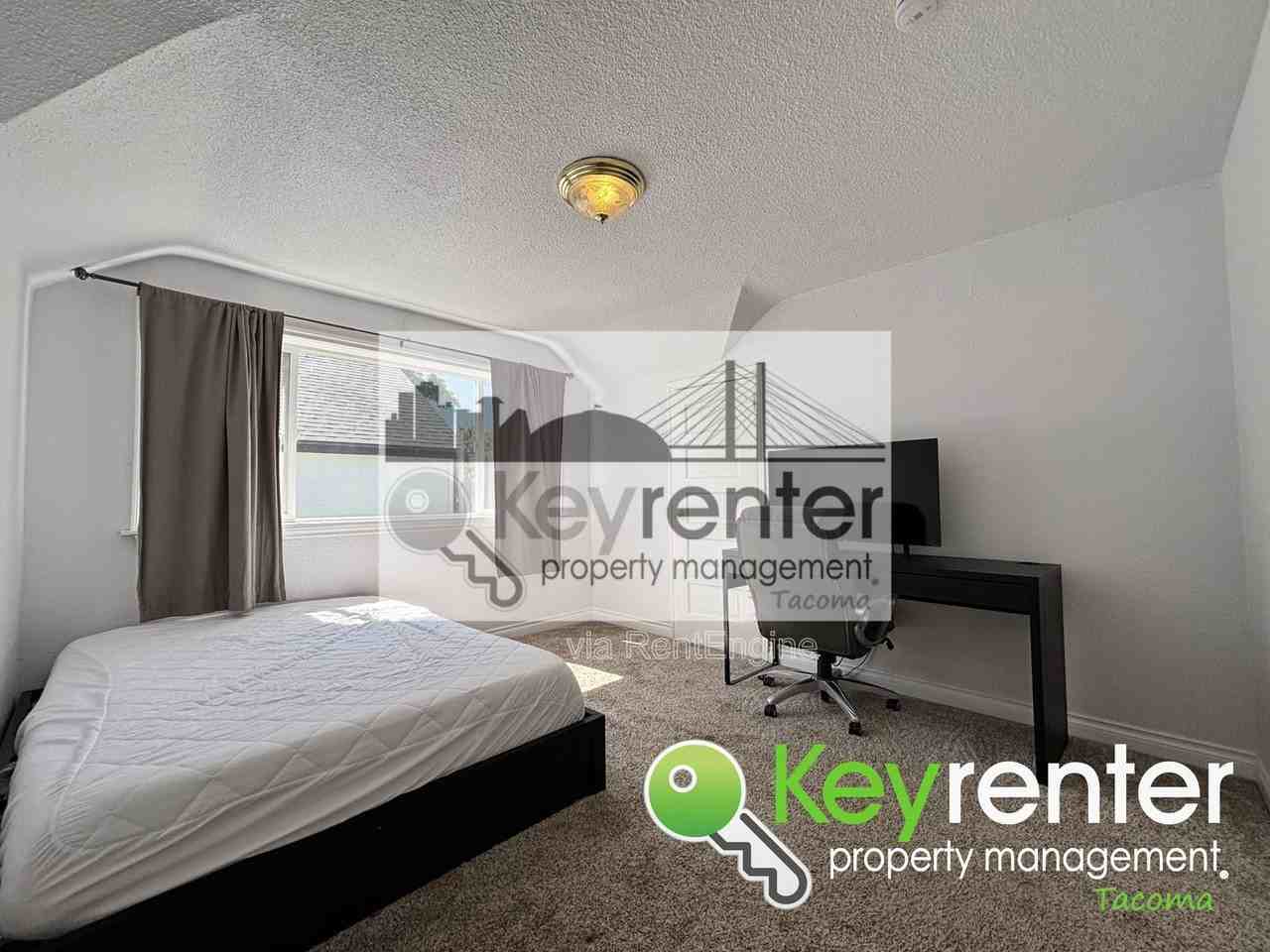 8434 Tacoma Ave S #3 - Photo 2 of 4