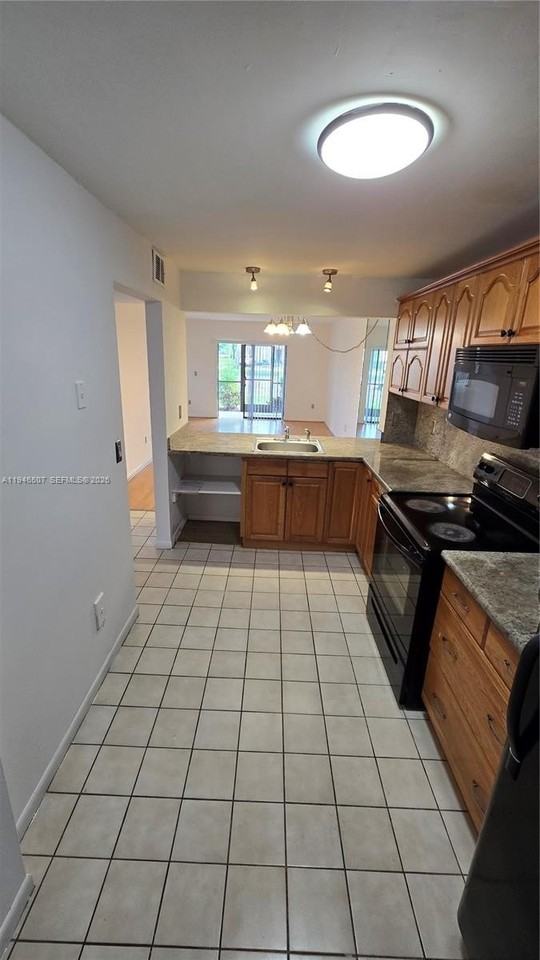 871 Ne 207th Ln #103-15 - Photo 6 of 17