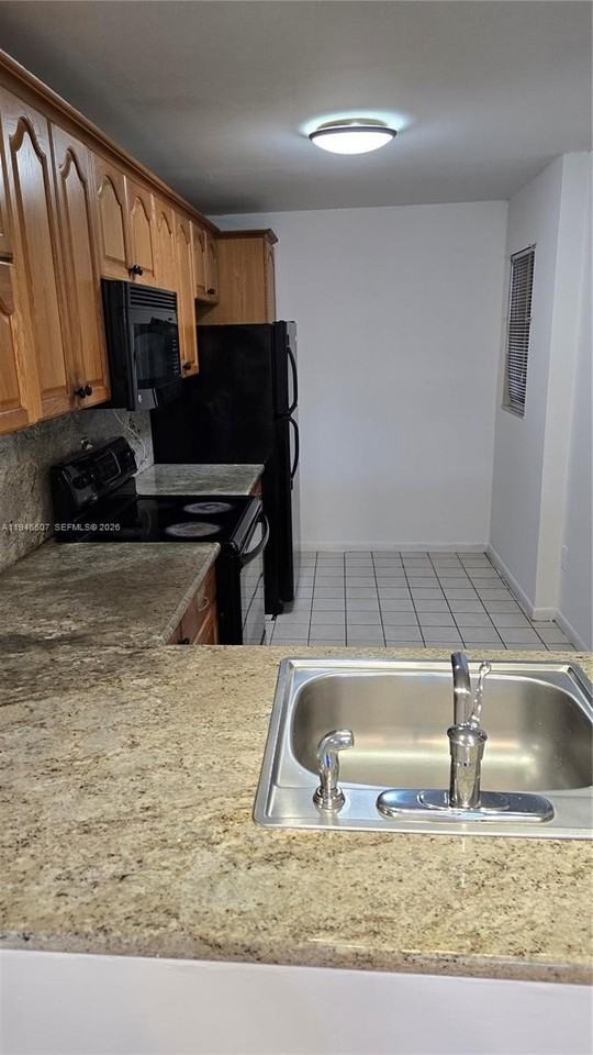 871 Ne 207th Ln #103-15 - Photo 7 of 17