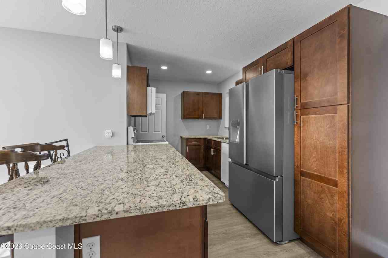 2395 Port Malabar Blvd Ne - Photo 7 of 23