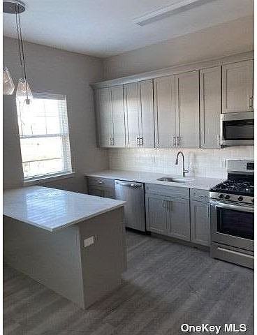 257 Hicksville Rd - Photo 2 of 5