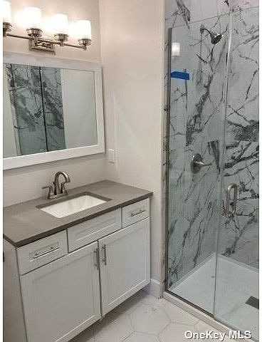 257 Hicksville Rd - Photo 3 of 5