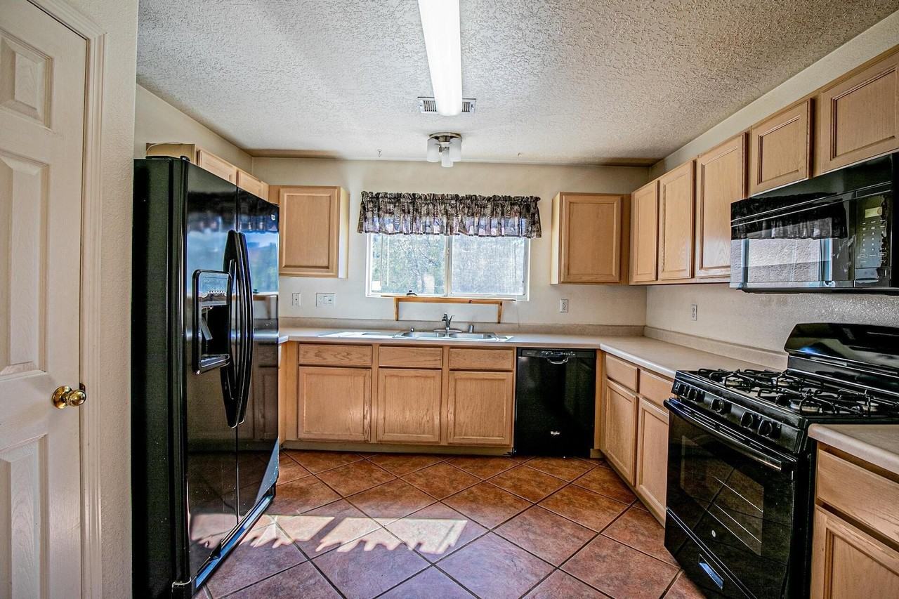 11311 Campo Del Oso Ave Ne - Photo 7 of 15