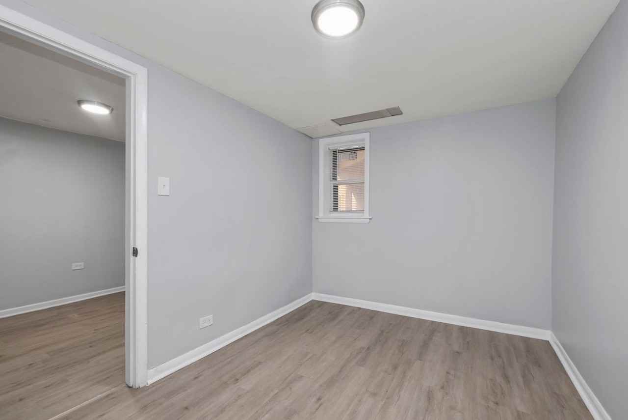 8007 S Eberhart Ave - Photo 7 of 8