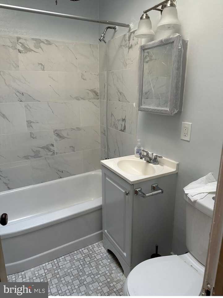 1042 E Cheltenham Ave - Photo 2 of 7