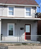 featured image of 6 W First St