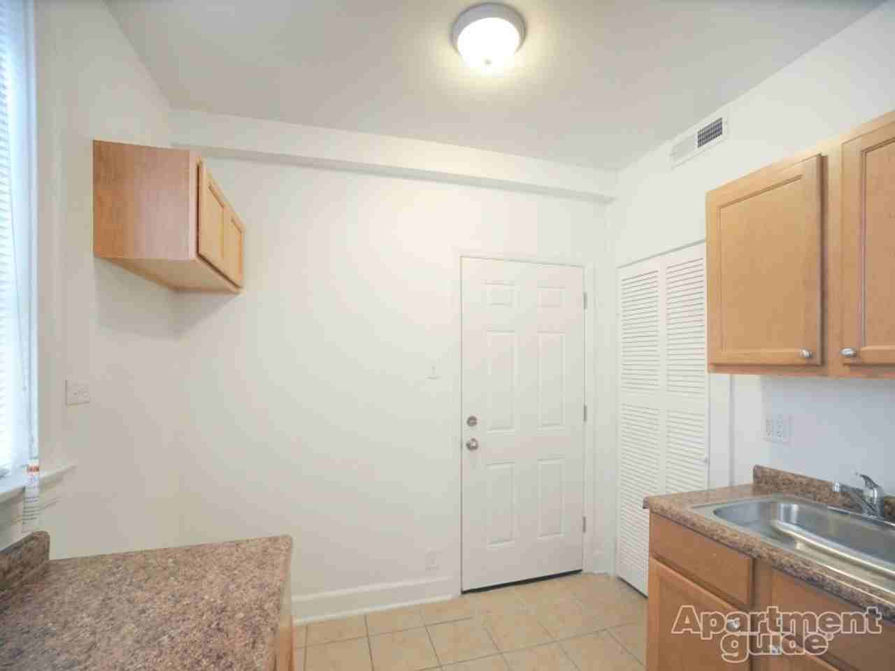 1108 E 82nd - Photo 4 of 14