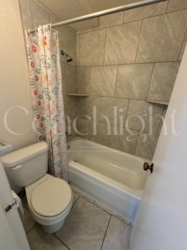 Coachlight Apartments - Photo 6 of 21