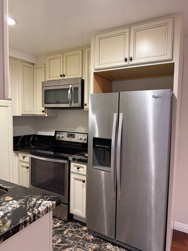 8710 Delgany Ave ##2 - Photo 4 of 21