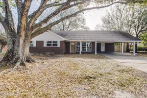 featured image of 2211 Popps Ferry Rd
