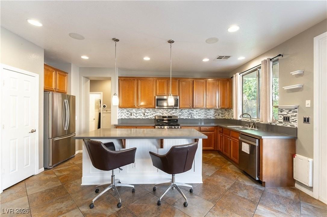 9428 Teton Ridge Ave - Photo 3 of 25