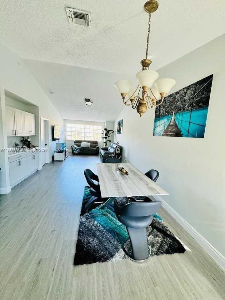 18334 Nw 68th Ave #L - Photo 3 of 12