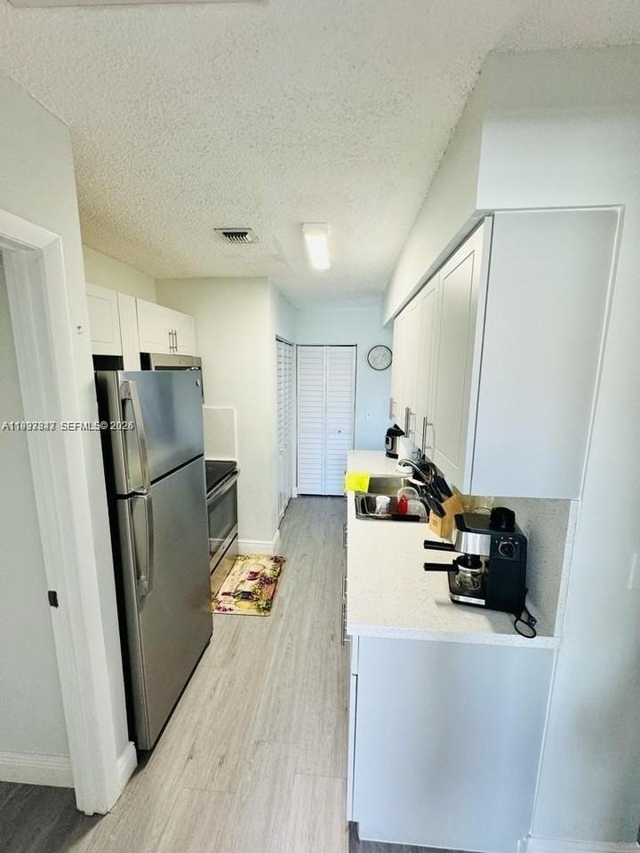 18334 Nw 68th Ave #L - Photo 5 of 12