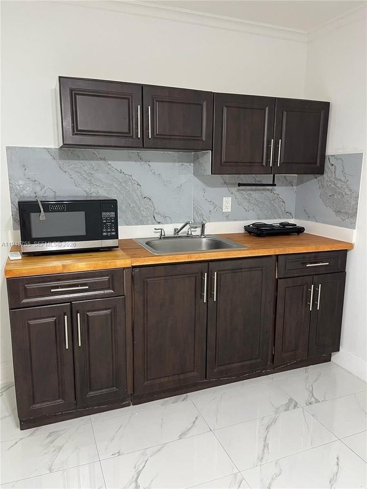 1703 Golfside Village Dr - Photo 3 of 6