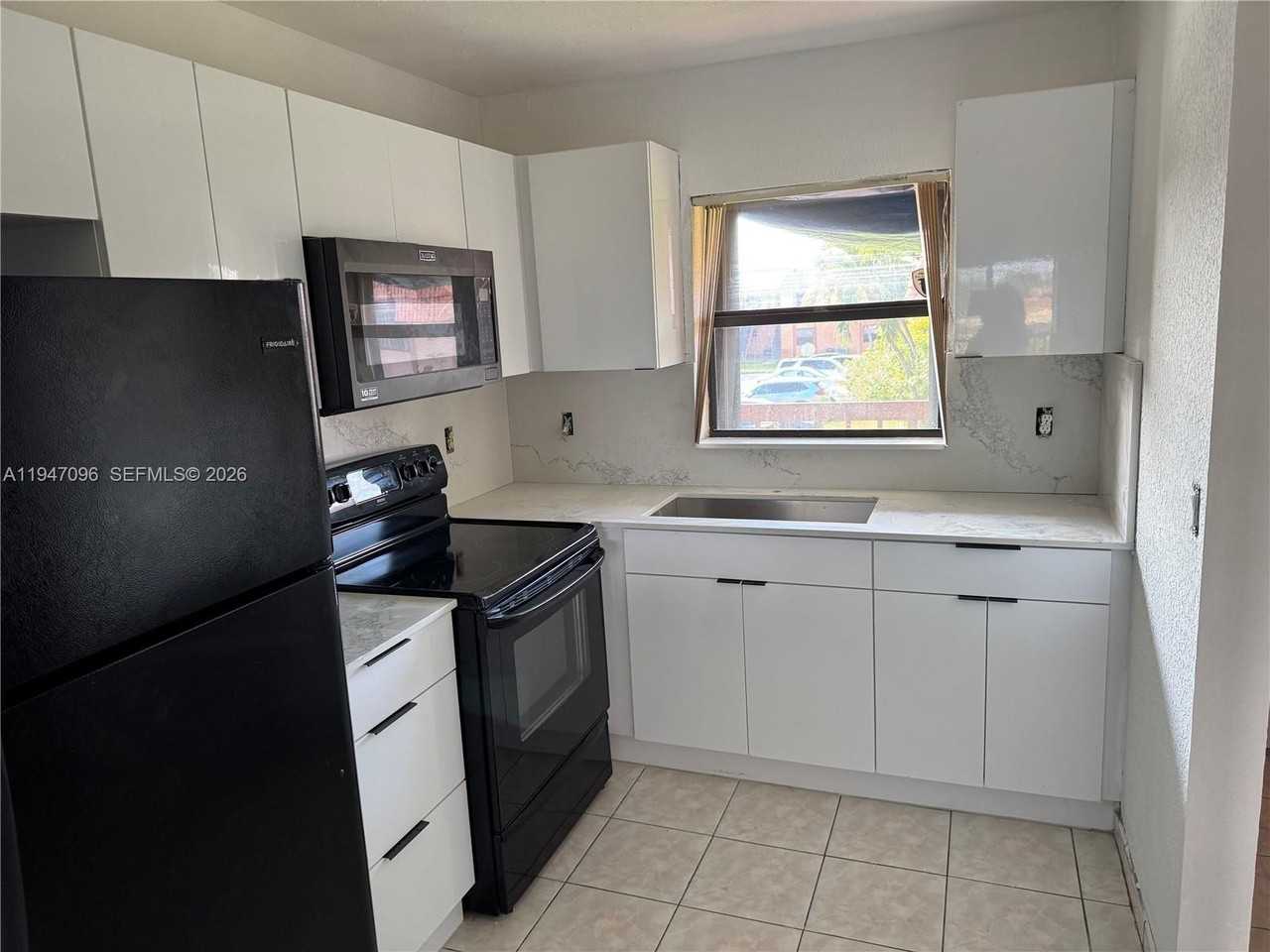 6465 W 27th Ave #43-203 - Photo 2 of 7