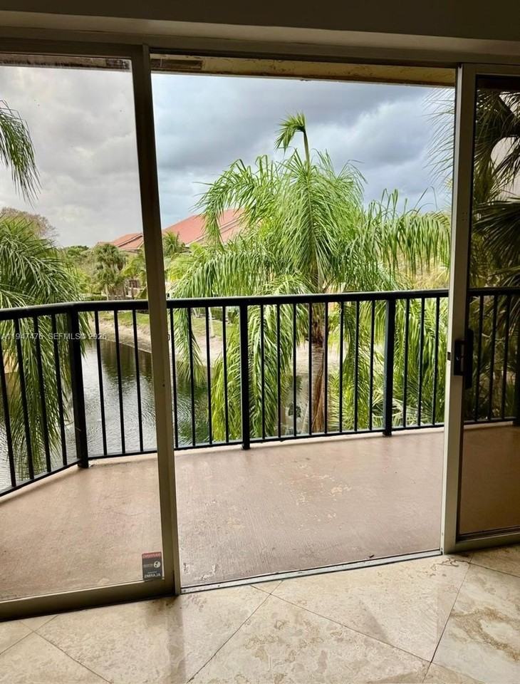 8871 Wiles Rd #306 - Photo 5 of 15