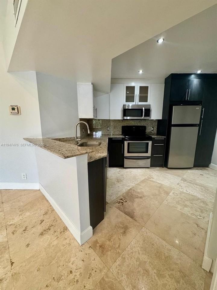 8871 Wiles Rd #306 - Photo 7 of 15