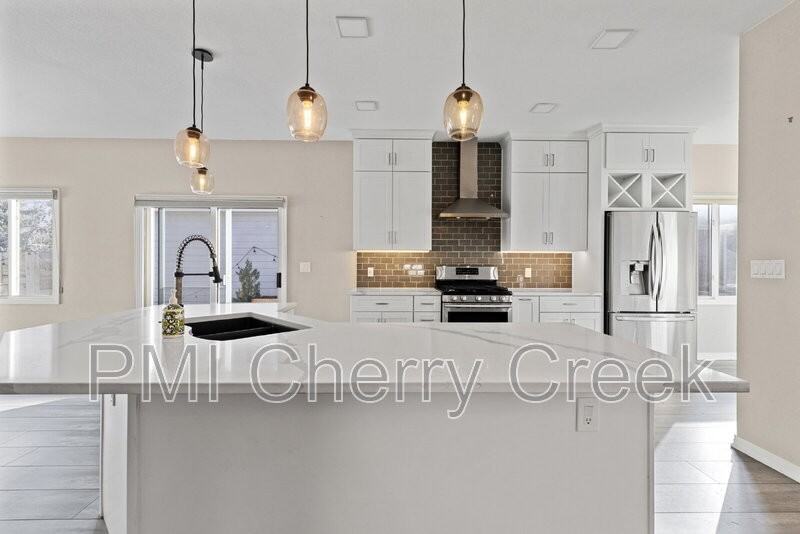 6545 E Exposition Ave - Photo 6 of 33