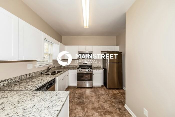 12945 Woodland Park Cir - Photo 7 of 16