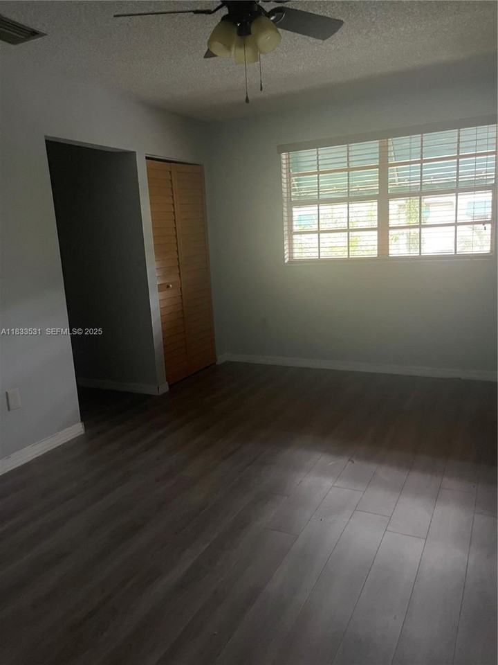 12390 Southwest 51st Place #12390 - Photo 2 of 7