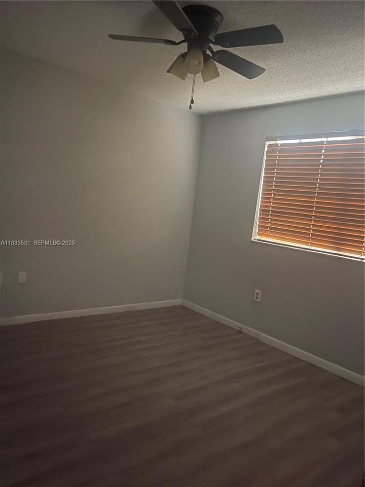12390 Southwest 51st Place #12390 - Photo 4 of 7