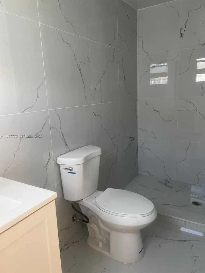 9625 Nw 36th Ave #REAR - Photo 6 of 7