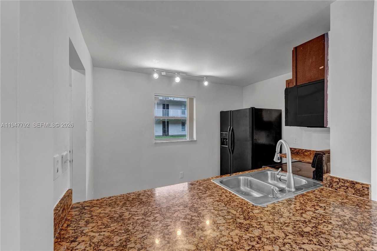 2800 Nw 56th Ave #H104 - Photo 6 of 34