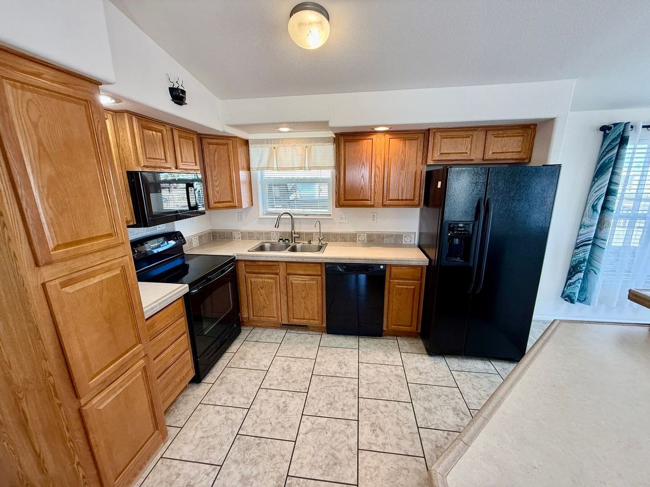 13239 E 48th Dr - Photo 5 of 30