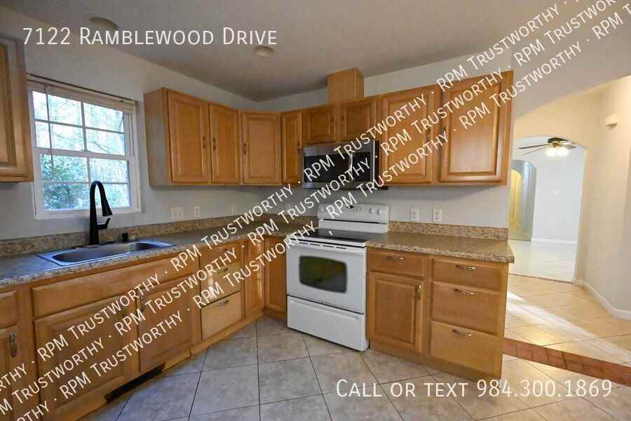 7122 Ramblewood Dr - Photo 2 of 50