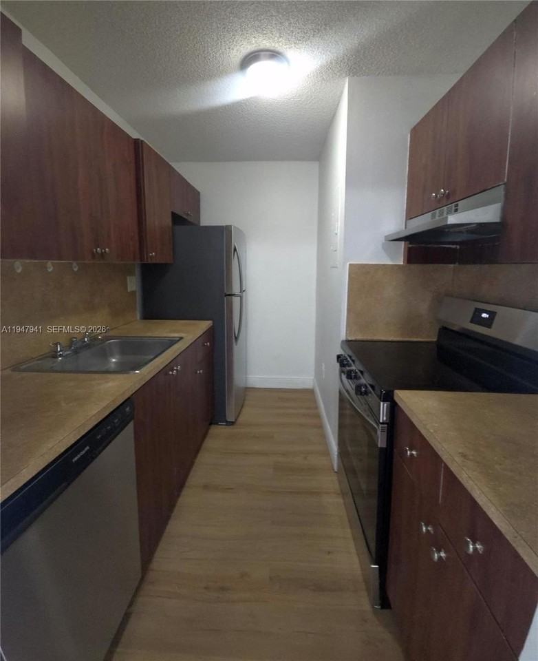 7423 Sw 152nd Ave #10-203 - Photo 2 of 15