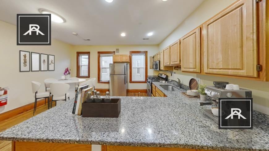 1524 Tremont St - Photo 5 of 9