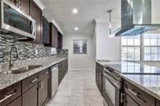 1389 W 33rd St - Photo 1 of 1