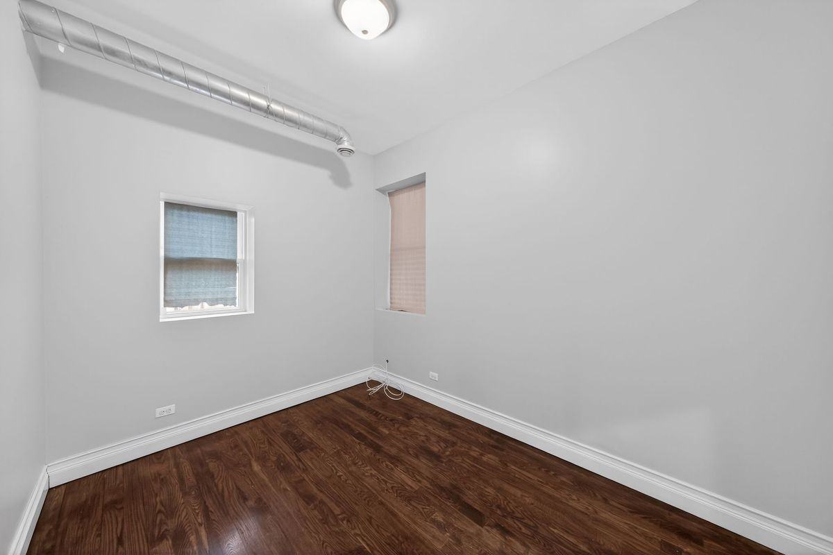 7038 S Eberhart Ave ##1 - Photo 2 of 14