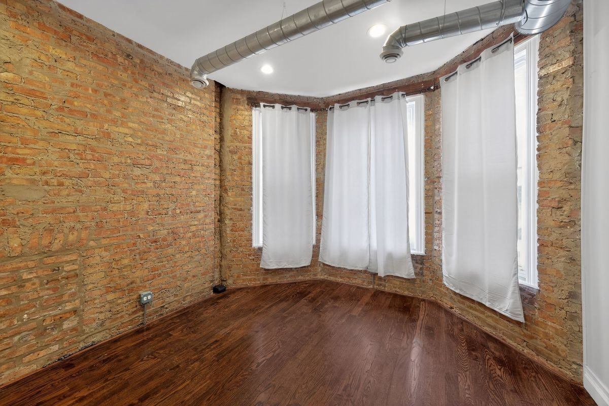 7038 S Eberhart Ave ##1 - Photo 5 of 14