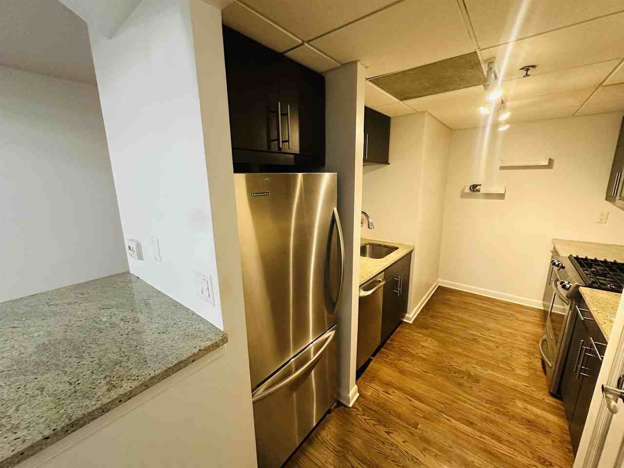 227 Christopher Columbus Dr #129B - Photo 2 of 19