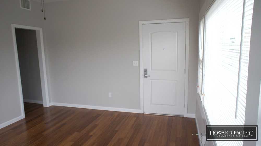 419 E 6TH ST - Photo 7 of 15