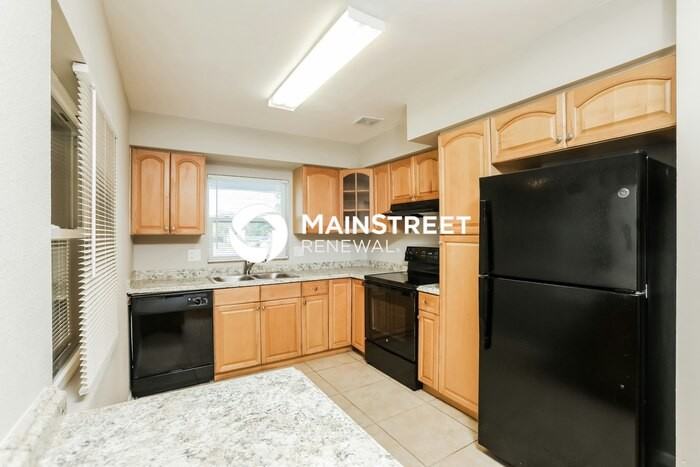 6908 Ambassador Dr - Photo 6 of 16