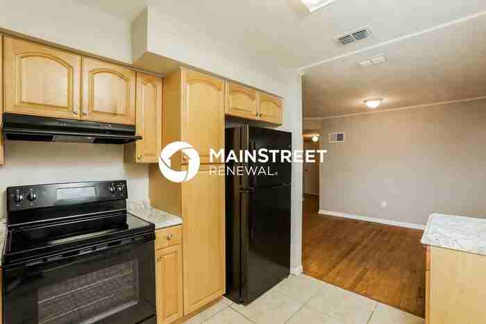 6908 Ambassador Dr - Photo 7 of 16