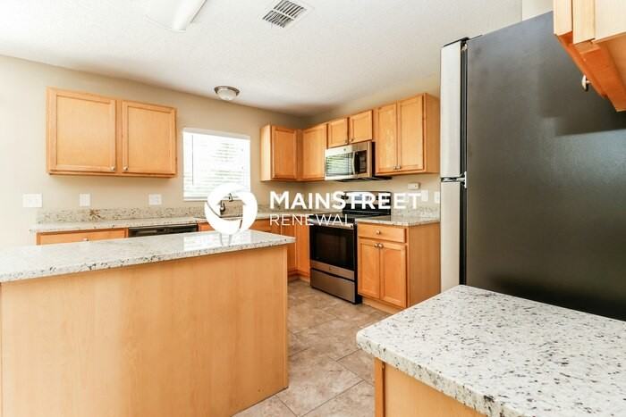 13336 Brewster Rd - Photo 6 of 17