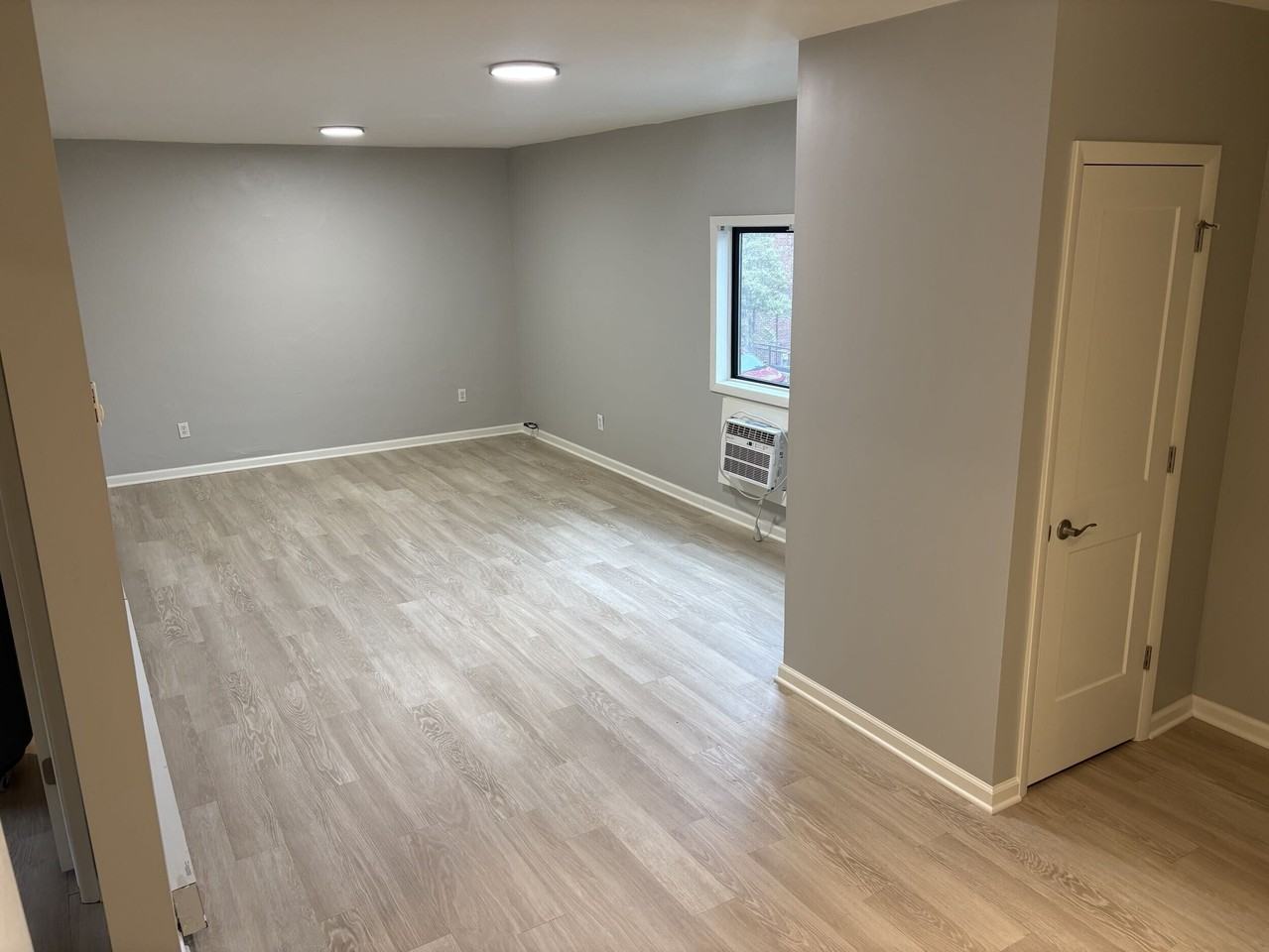 111 E 10th St #3-2ndFL - Photo 5 of 7