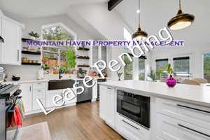 featured image of 28384 Kinnikinnick Rd #1