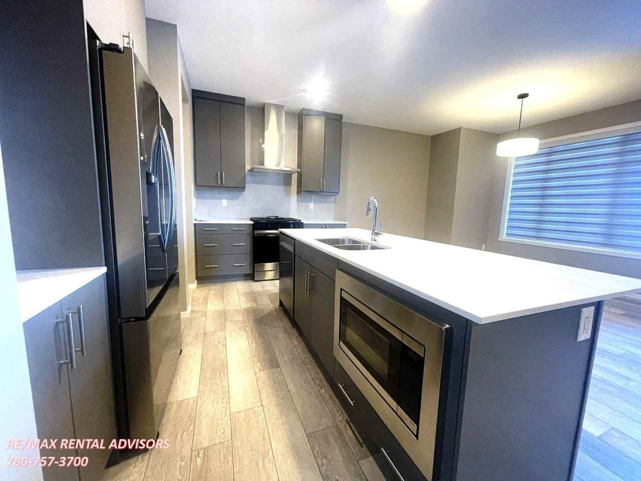 4698 16a Ave Nw - Photo 5 of 24