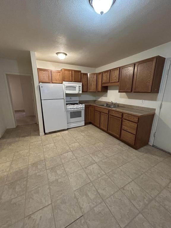 129 W 2nd St - Photo 2 of 9