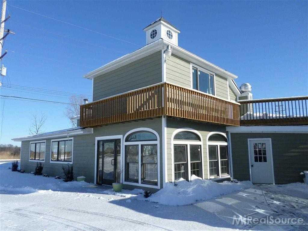 6213 Pointe Tremble Rd - Photo 3 of 22