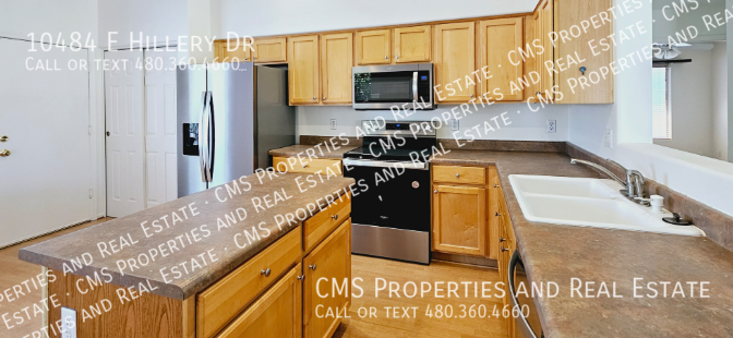 10484 E Hillery Dr - Photo 6 of 26