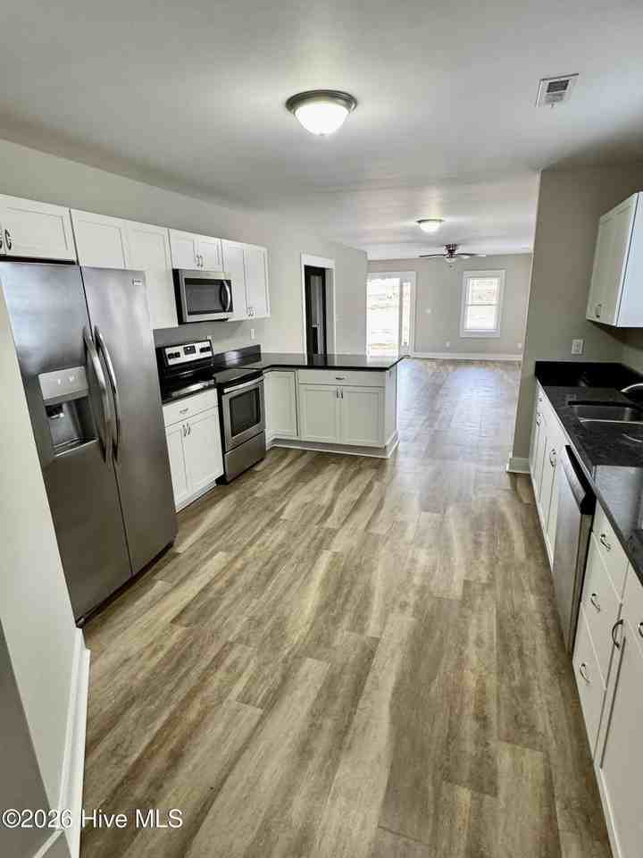 415 W 3rd St - Photo 2 of 14