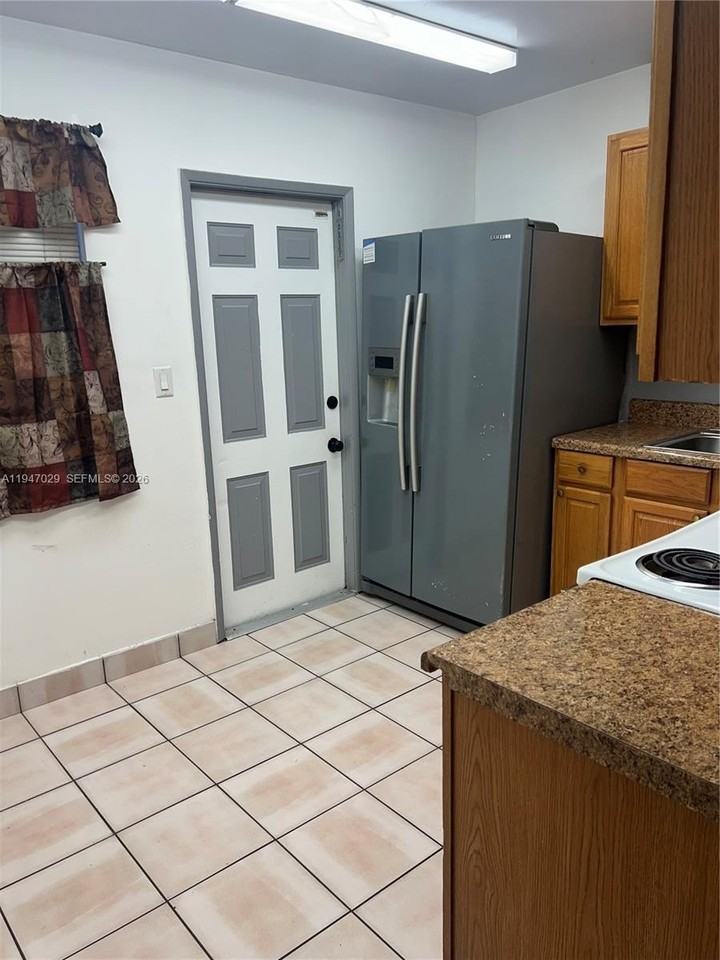 9203 Nw 38th Dr #12 - Photo 2 of 17