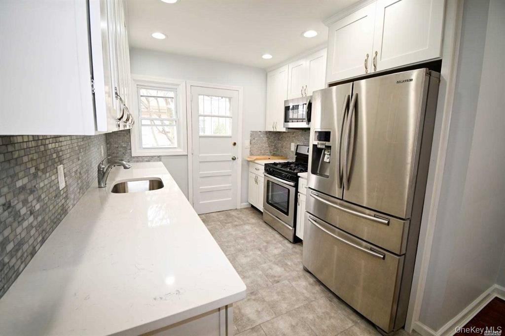 241 Woodbury Rd - Photo 7 of 13