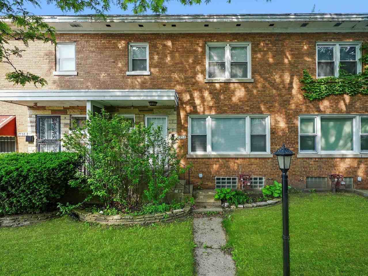 7754 S Yates Blvd - Photo 2 of 32