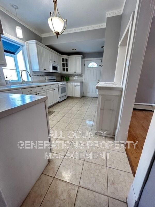 1361 E 43rd St - Photo 3 of 16